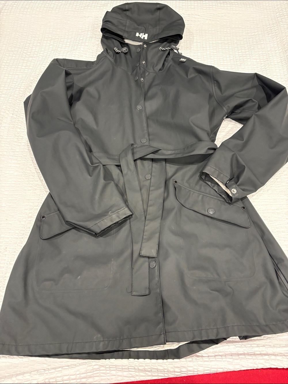 Helly Hansen Ladies Black Hooded Rain Coat with Belt
Size XL Fitted